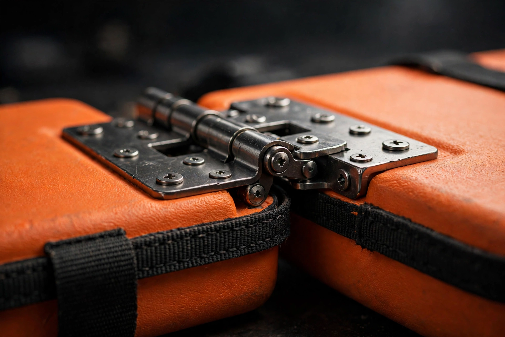 Heavy-duty 180-degree lay-flat hinge on the orange EVA first aid workstation